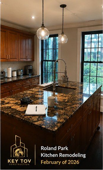 Roland Park kitchen island before renovation, dark granite countertop