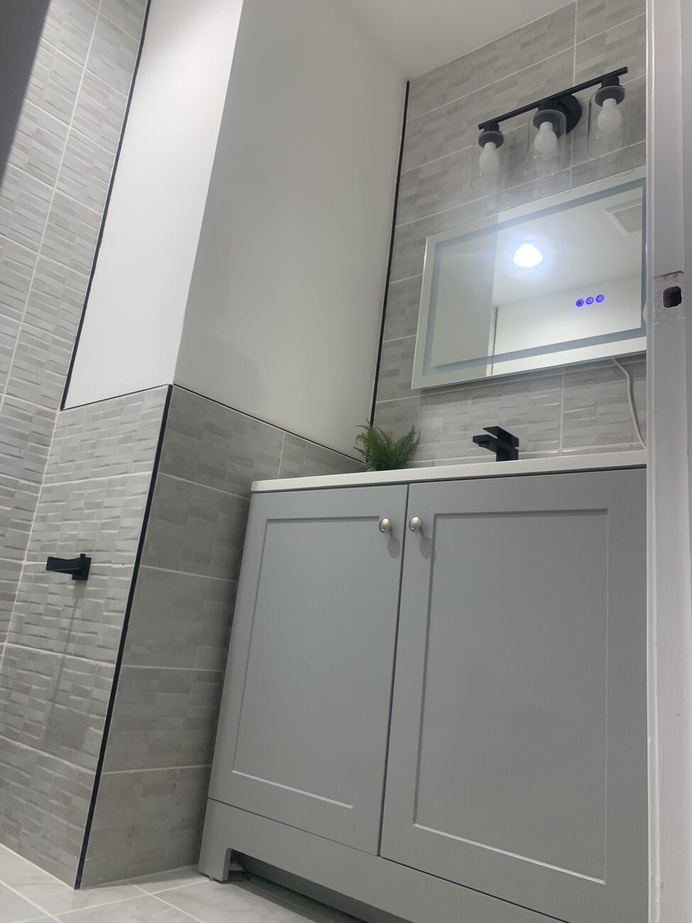 Powder room vanity nook under construction during a Gwynn Oak bathroom remodel